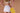 Woman with yellow Doozy pickleball paddle - premium equipment by Pulse Pickleball