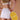 Woman with yellow Doozy pickleball paddle - premium equipment by Pulse Pickleball
